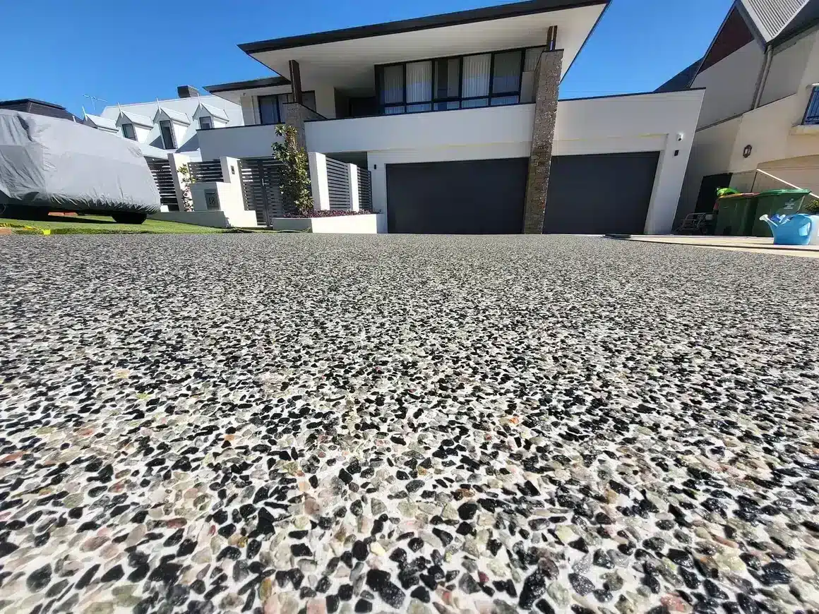 Exposed aggregate concrete driveway finish